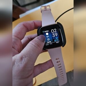 Fitbit Versa 2 with charger and screen protector